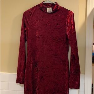 A burgundy never worn dress from FashionNova .